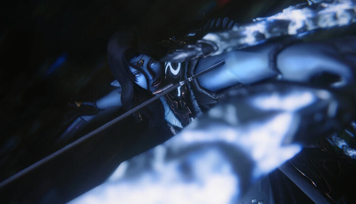 A dynamic, low-angle cinematic FFXIV Group Pose featuring an archer with blue skin, pointed ears, and long dark hair an elezen. Shot with wide letterboxing, the perspective looks past the foreground of an intricately patterned bow, focusing on the characte